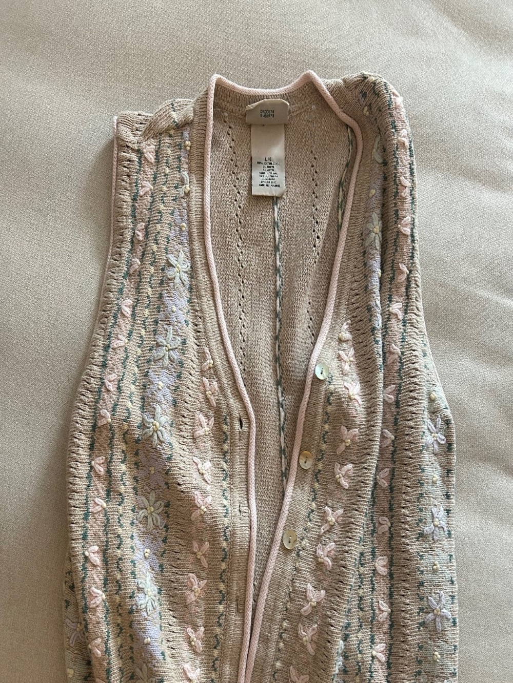 Beige sweater vest